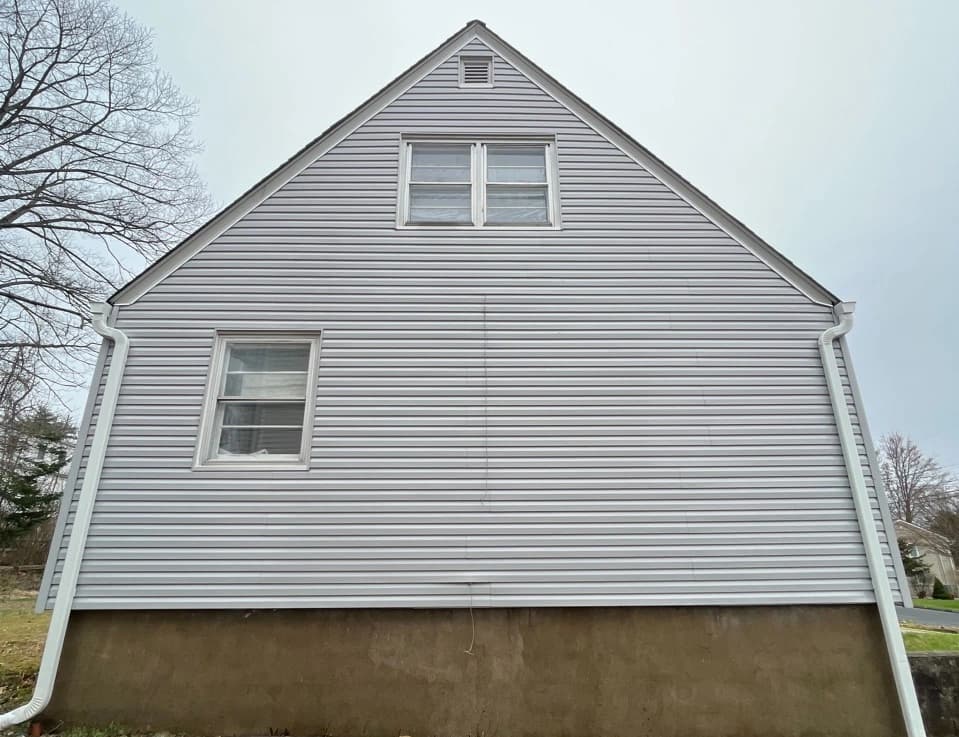 Medina Power Washing technician performing detailed house washing in Medina residential area