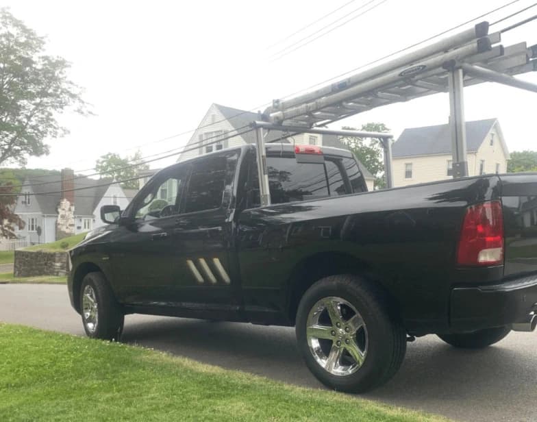 Fleet vehicle cleaning service being performed by Medina Power Washing in Medina